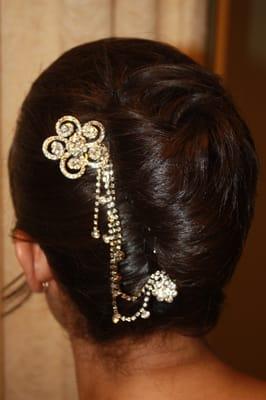 French twist, twisted and open at top (my request).  Credit:  http://www.kimberlymjaseth.com/