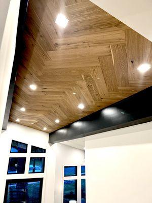 FCI Tysons installed herringbone design on 15ft ceiling Mannington-Latitude Collection