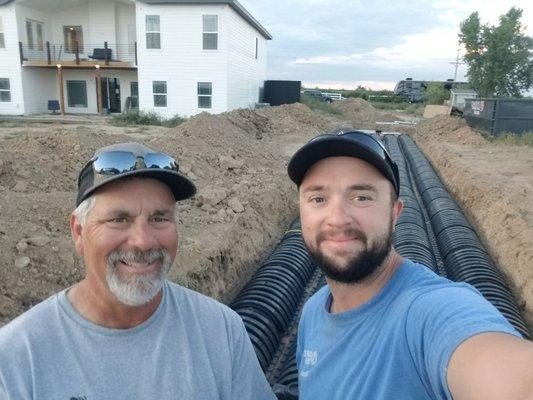 Mitch and Kyle installing a conventional system