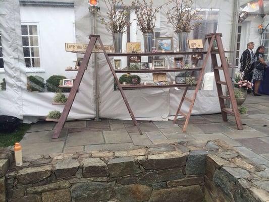 Wedding photo display that ultimately became a dessert display later in the night.