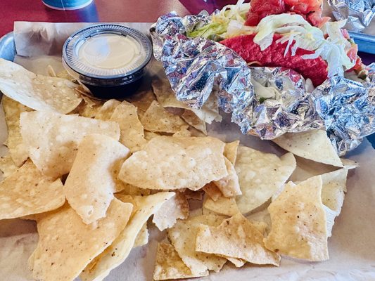 Chips, side of queso and spicy birra taco