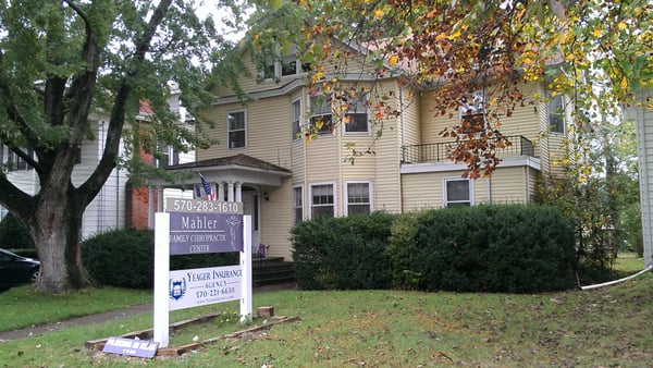 Front of office building and sign