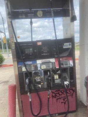 Old, old broken gas pumps with bad gas