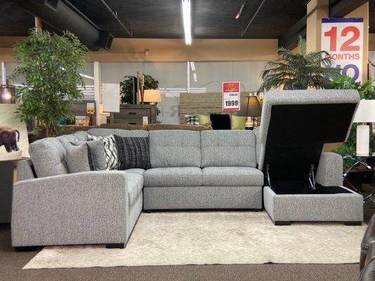 Loved this storage sectional that also had a roll out ottoman foot rest.