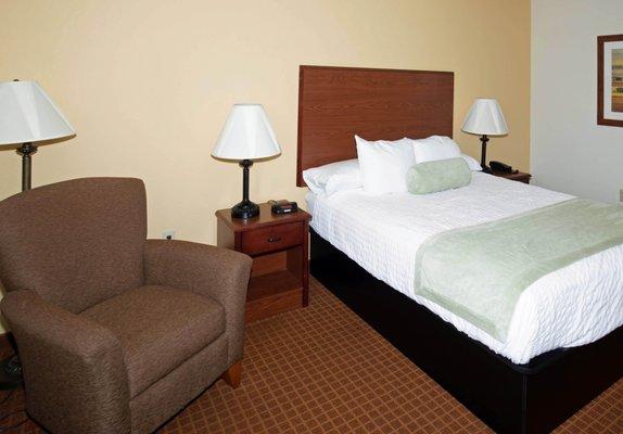 Single Queen Guest Room- One queen bed and private bathroom with shower. Non-smoking.