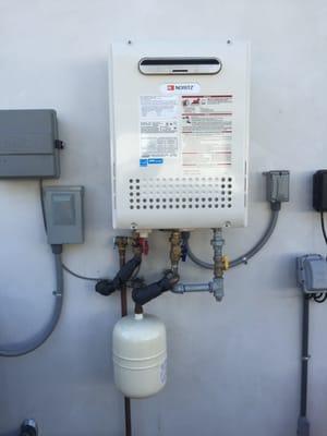 Tankless Water Heater with expansion tank. This is a Noritz Brand