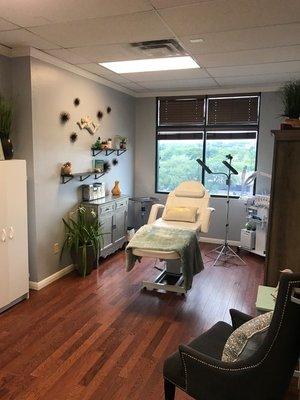 Beautiful relaxing room with a lot of natural lighting.