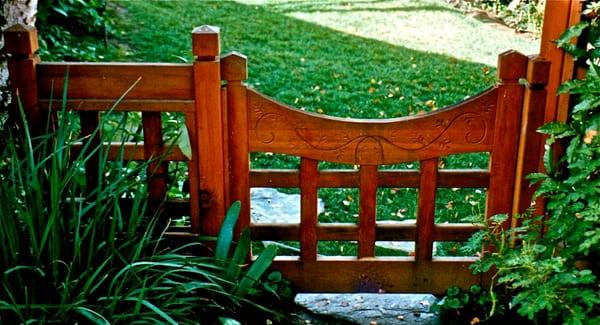 Beautiful redwood gate with hand carving.