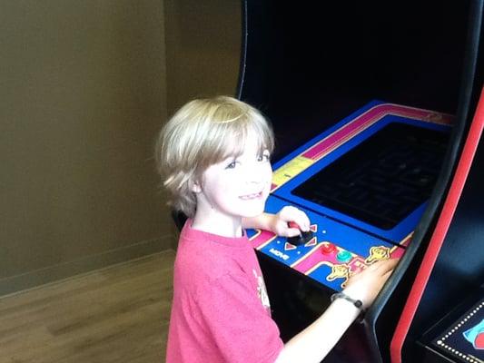 Here's another one of our patients having fun playing games in the arcade.  Our arcade games have 60 games on each machine!