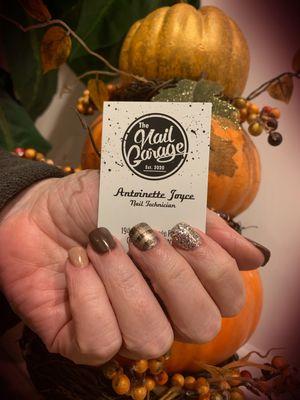 Plaid nails with fall colors.