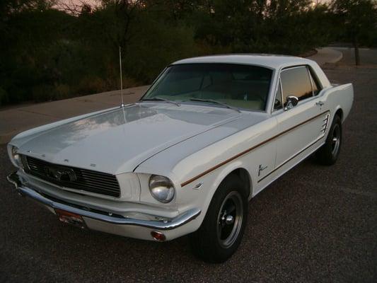 1966 ford mustang coupe, 289 2 bbl, automatic transmission, painted white with a gold pearl flake, and parchment interior.