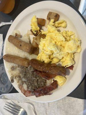 Buttery grits with liver pudding, bacon, turkey sausage and eggs.