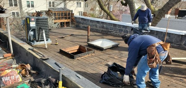 Remove all roofing materials for the new TPO installation