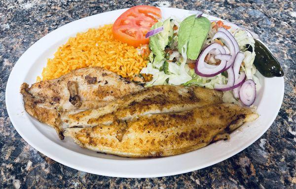 Mexican Style Grilled Catfish. 
 Served with Rice and Salad.