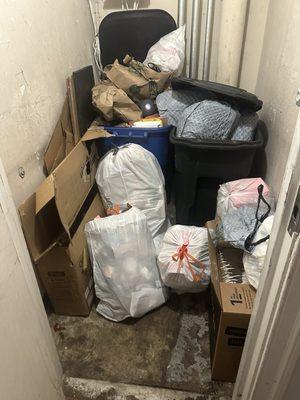 Trash room located right next to residents front door - smells awful and is not taken out nearly enough