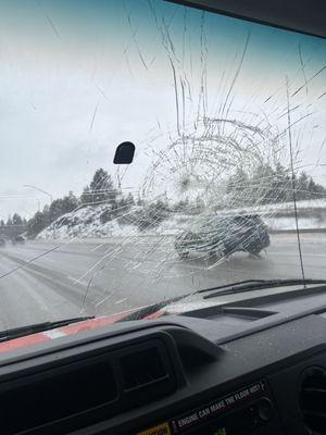 The broken windshield right after it happened