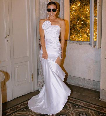 The bride looks stunning in our custom wedding dress