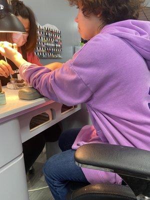 Daughter getting her nails done for the first time