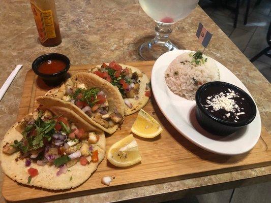 2 fish tacos, one shrimp. Rice and beans, house lemonade.