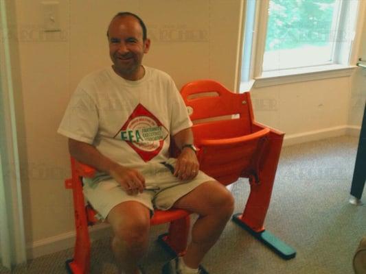 A happy Mets fan customer after receiving his gift of a Shea Stadium seat!