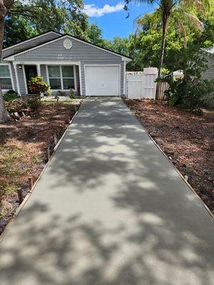 New drive way. Roots broke drive way. We removed roots and repoured. All completed in 2 days