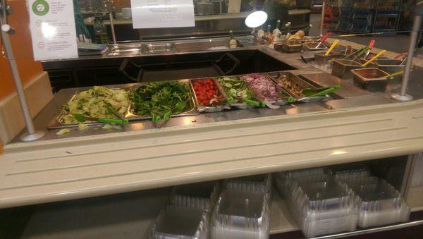 Salad bar by the pound. Fresh fruits are heavy!