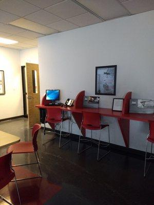 Driver's room workstations. Computer, landline phone, local restaurants and hotels directory.