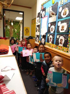 Miss. Mercedes Kindergarten class showing off art work!