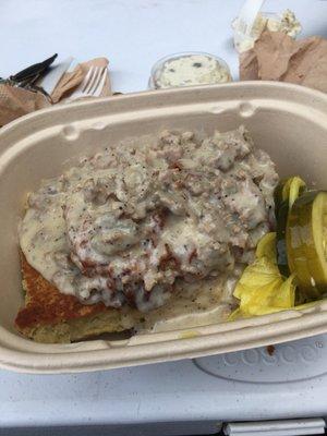 Fried Chicken on top of corn bread with sausage gravy! Sooo Yummy!! I cant wait to eat this again!!