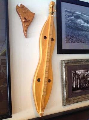 A door harp and a dulcimer on display