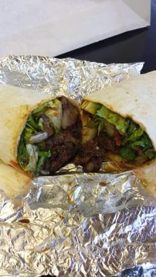 Jerk wrap with lots of vegetables.