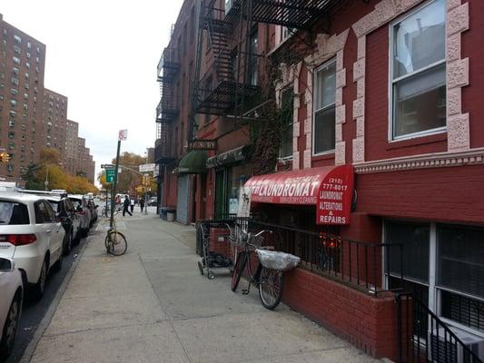 There are two laundromat and Crystal Dry Cleaners is down the stairs. Not on the street level.