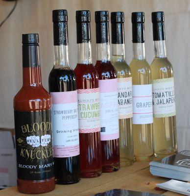 Full line of drinking vinegars by Grumpy Dog Shrub Co