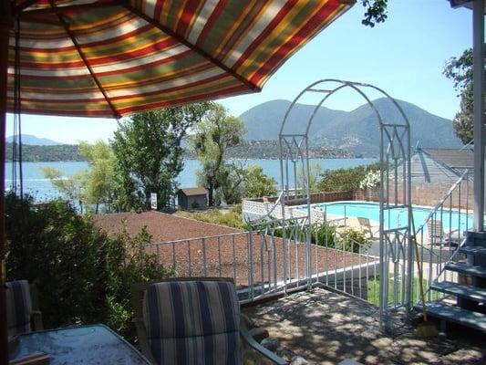 Veranda has yard area and a balcony.  The yard is same height as the upstairs.  Great view of sunrise, sunset, lake and Mt. Konocti.