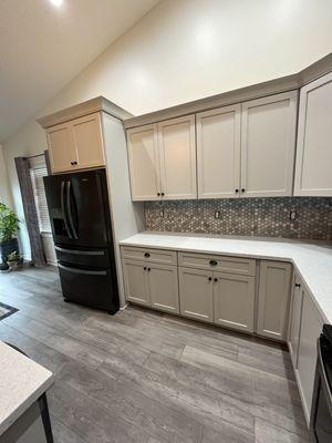 Kitchen Remodel 
- Kitchen Cabinets 
- Flooring installation 
- Light fixture installation 
- Countertop Installation