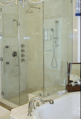 Glass walls for showers make the bathroom look bigger and muti-heads make it spa-like.