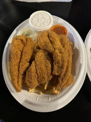 Catfish platter  French fries  Pickle  Ketchup Tartar sauce  Lemon wedge