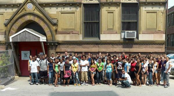 Youth outside the Hyde Square Task Force Community Development Center (behind Blessed Sacrament Church)