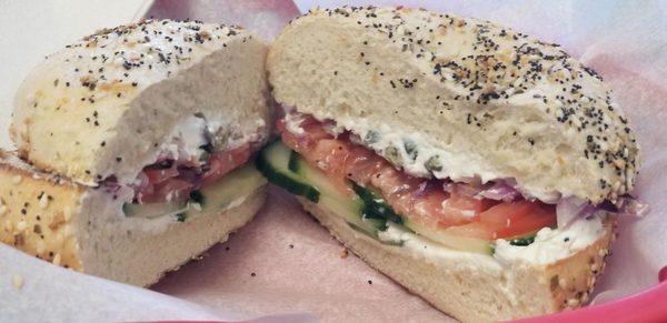 Everything bagel lightly toasted with plain cream cheese, capers tomato, red onion, and cucumber. One of my favorites.