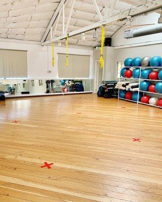 Socially distanced group fitness room. Each personal workout zone is spaced 10ft. apart