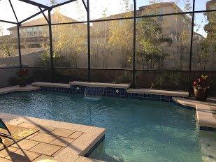 Our pool has a waterfall, and several shelf areas for sitting