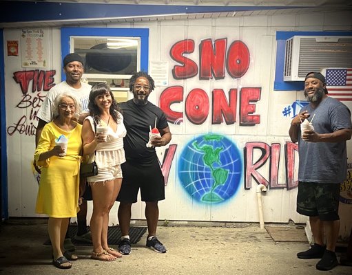 Timothy (the owner), mama, me, honey, and big brother all enjoying Sno Cone World!!