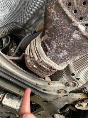 Catalytic Converter stripped on inside and bandaged