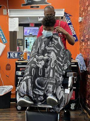 My son getting a hair cut.