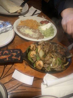 Steak and shrimp fajitas. My son always gets fajitas when we come here! They come out sizzling and smells amazing