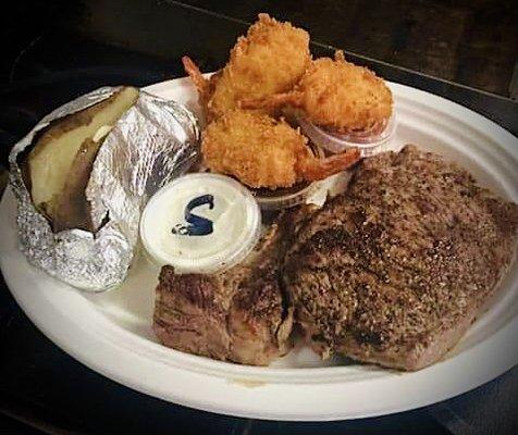 Friday Night Special! 8 oz ribeye and fried shrimp accompanied by a baked potato. Served with cocktail sauce, A1, and sour cream.