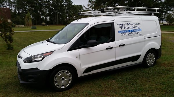 McMahon Plumbing company vans serving all of the OBX and Currituck