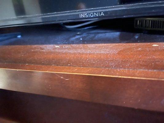 Dust under the TV.