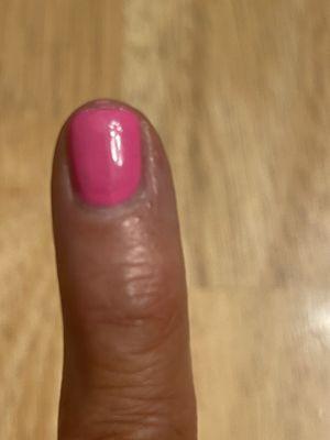 Manicure with gaps at base of nail. Polish wasn't applied close enough to the cuticle.