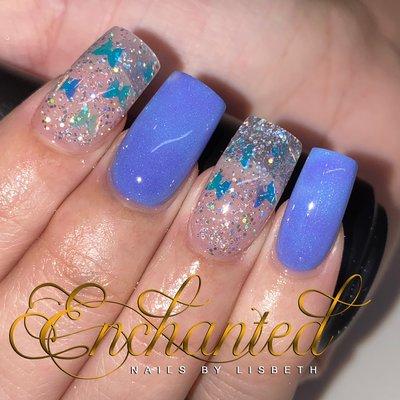 All acrylic nails with butterflies encapsulated